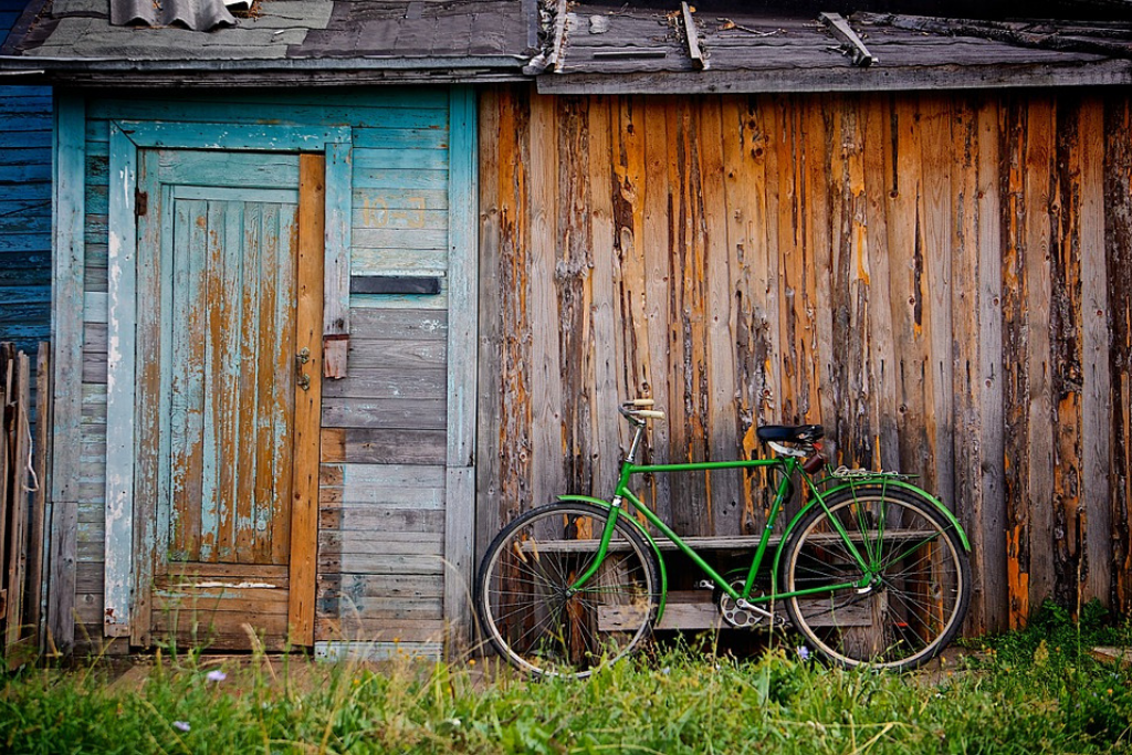 bicycle in front of a old house